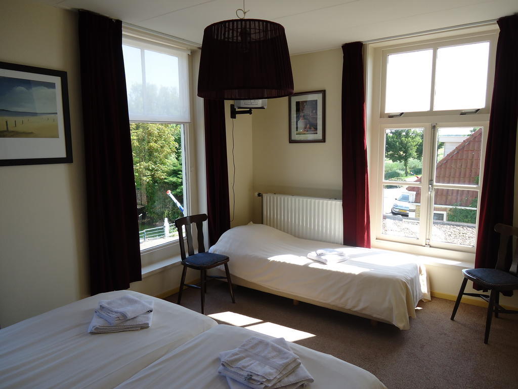 Hotel "De Steenen Man" Zurich Esterno foto